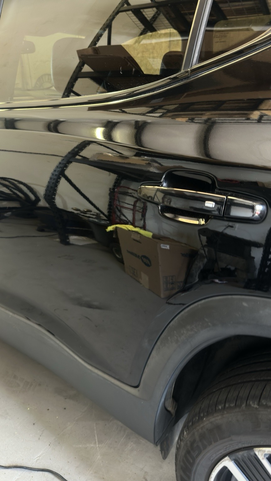 Black vehicle after exterior polishing